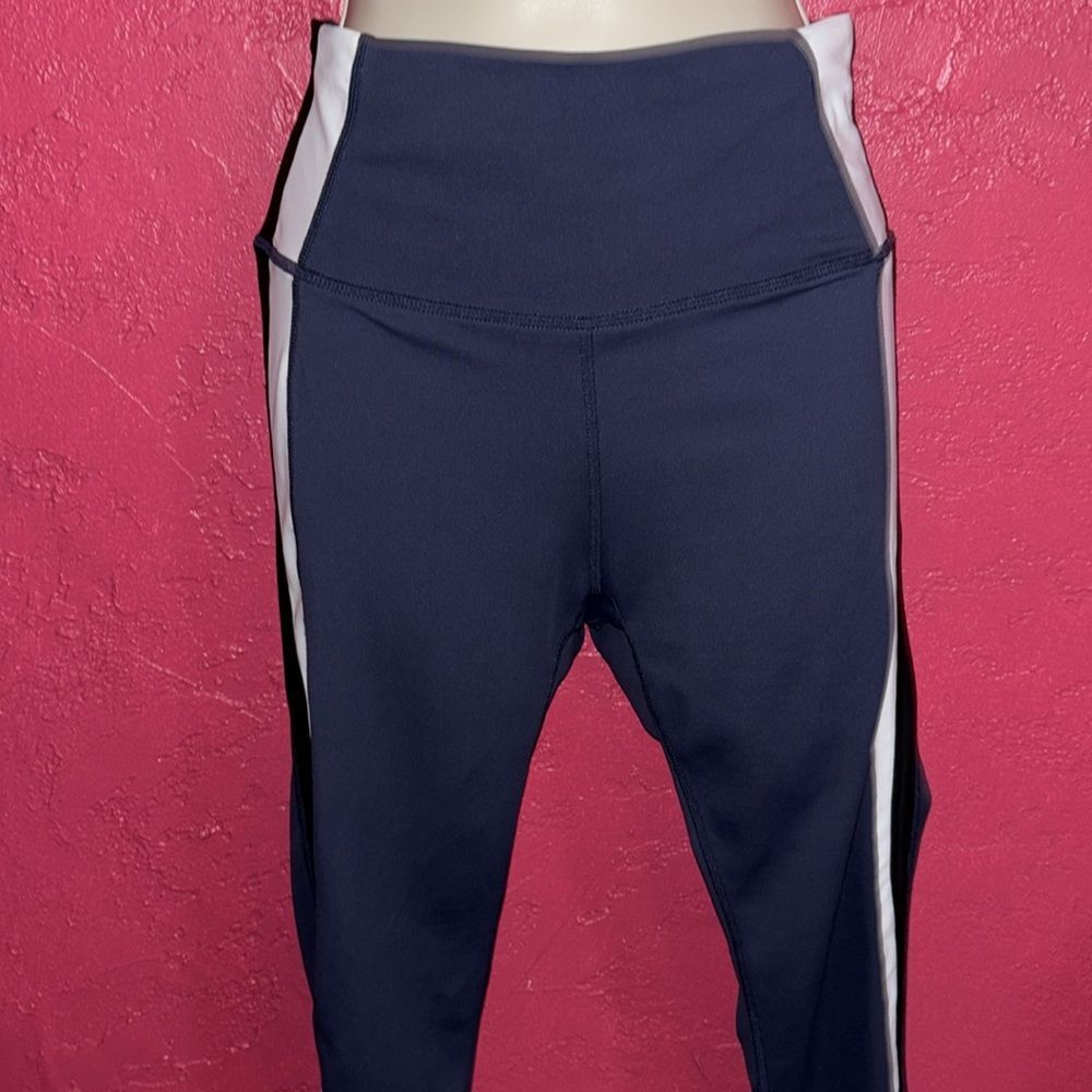 ALLFENIX leggings. Navy blue with black and white stripes. Sz medium.